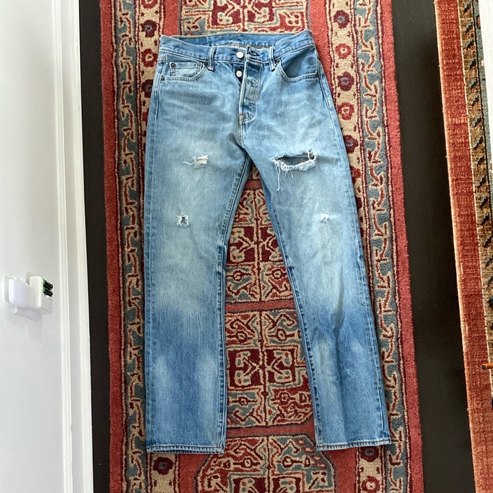 Distressed Blue Levi’s 501 Jeans